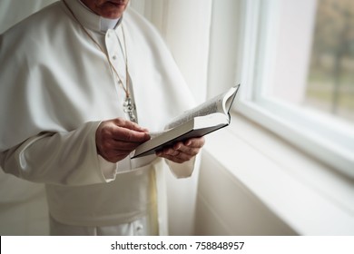 Pope Reads The Bible In His Office