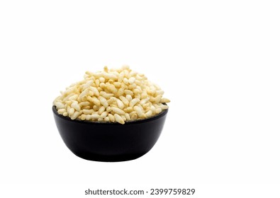Popped Rice or Puffed Rice in a Black Bowl Isolated on White Background with Copy Space