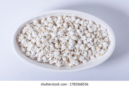 Popped Sorghum/ Jowar Pops In White Bowl On White Background 