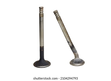 poppet valves pair. intake and exhaust valves, bent by collision with piston after timing belt rupture. black and whitish-grey deposits caused by long engine exploitation.  white back. clipping mask