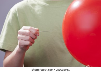 Popping A Balloon.