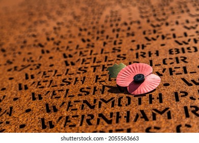 Poppy casting a shadow over some of the 57000 names who lost their lives during WW2 defending England as part of bomber command seen at Bomber Command Centre, Lincoln in June 2021.