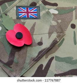 Poppy on a British army uniform background