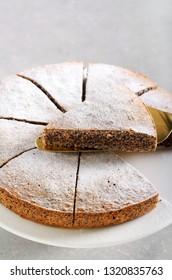 Poppy Seed Torte With Icing Sugar On Plate