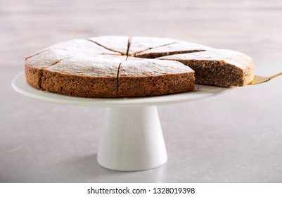 Poppy Seed Torte With Icing Sugar On Plate