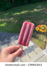 A popsicle being held up