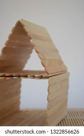 Popsicle Stick House On A White Background