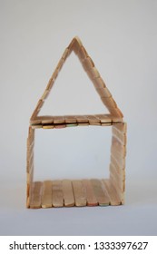 Popsicle Stick House On A White Background