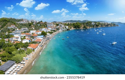 The popular beach of Megali Ammos nexto the town of Skiathos island, Sporades, Greece