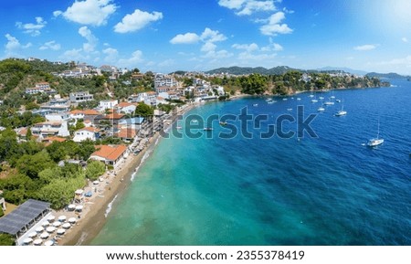 The popular beach of Megali Ammos nexto the town of Skiathos island, Sporades, Greece