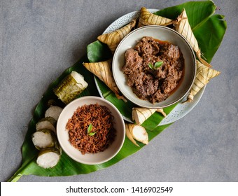Popular food for breaking fast during Ramadan / Ramadan Food / Food like lemang, ketupat palas, beef and chicken rendang and serunding are commonly eaten together