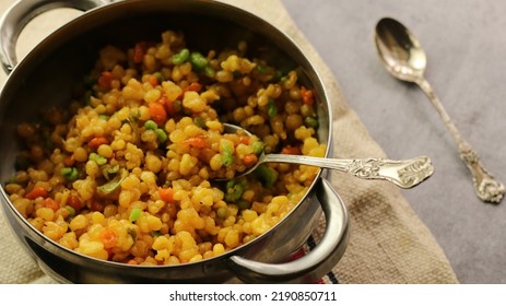 Popular Indian Colorful Sweet Known As Boondi Is Served In Gray Background. (Boondi Stock Photo)