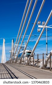 Popular Lined And Marked Pedestrian And Bicycle Path Next To The Streetcar And Bus Roadway Through The Rope Tilikum Crossing Bridge Across The Willamette River In Down Town Portland Oregon