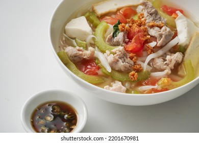 Popular Malaysia Hawker Food - Bitter Gourd Soup With Rice Noodles, Tomatoes, Tofu And Minced Meats