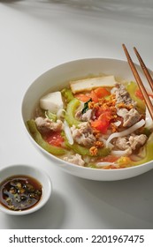 Popular Malaysia Hawker Food - Bitter Gourd Soup With Rice Noodles, Tomatoes, Tofu And Minced Meats