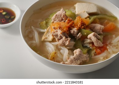 Popular Malaysia Hawker Food - Bitter Gourd Soup With Rice Noodles, Tomatoes, Tofu And Minced Meats