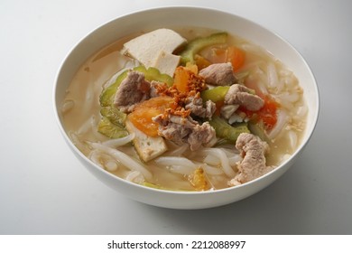 Popular Malaysia Hawker Food - Bitter Gourd Soup With Rice Noodles, Tomatoes, Tofu And Minced Meats