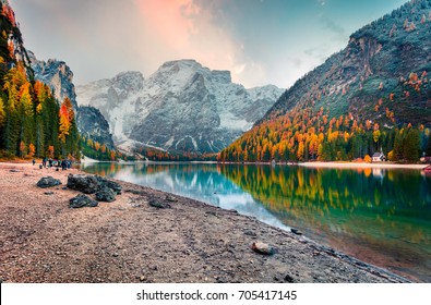 Popular photographers attraction of Braies Lake. Colorful autumn landscape in Italian Alps, Naturpark Fanes-Sennes-Prags, Dolomite, Italy, Europe. Beauty of nature concept background. - Shutterstock ID 705417145