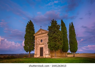 Popular photography and touristic location in Tuscany, amazing Vitaleta chapel at colorful sunset, Pienza, Tuscany, Italy, Europe. Travel background