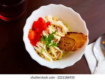 Popular Russian Salad Of Napa Cabbage, Ham And Boiled Eggs Dressed With Light Mayo Traditionally Served With Crispy Toasts.