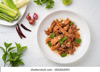 Popular Thai Food.Spicy Grilled Pork Salad,grill Pork With Charcoal And Sliced Mixed With Lime Juice,fish Sauce,sugar And Chilli Flakes (Moo Nam Tok).Top View.