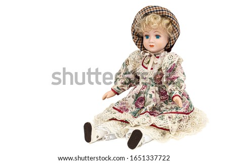Porcelain doll,  isolated on white background
