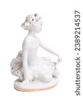 porcelain figurine of a little ballerina isolated on white.