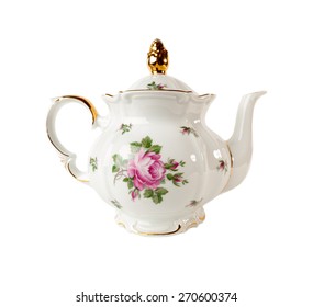 Porcelain teapot with a pattern of roses and gold in classic style isolated on white