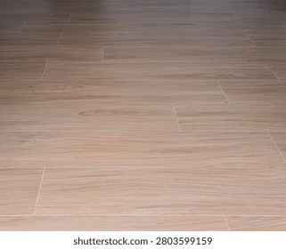 Wood‑Look Porcelain Tile Floor Featuring Offset Staggered Pattern Design