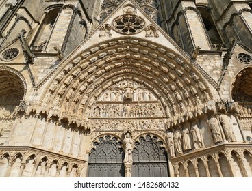 Porch of the central portal of cathedral Saint Etienne in Bourges, Cher, France - Powered by Shutterstock