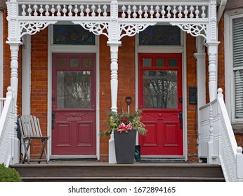 Porch Of Victorian House With Old Elaborate Wood Spindle Trim