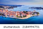 Porec, Croatia. Aerial drone view of old town and Adriatic Sea, Istria region, Europe. Travel background concept.