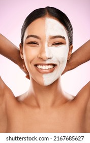 Pore-less Skin Is A Pamper Session Away. Studio Shot Of An Attractive Young Woman Having A Facial Against A Pink Background.