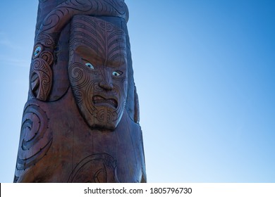 Porirua / New Zealand - July 26 2020: Maori Carving Pou Tangaroa Standing In Pukerua Bay