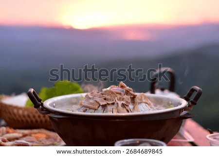 Pork BBQ with mountain view, Pork BBQ dinner with mountain view, cooking and eating Moo Kata, Thai barbecue grill pork with mountain view
