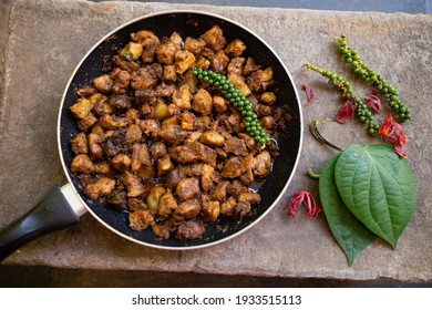 Pork Or Beef Roast Kerala Style With Vattayappam Steamed Rice Cake , Homemade Curry With Indian Spices , Asian Cuisine Spicy Meat Curry Cooked In Coconut Milk . Side Dish Christian Food Christmas