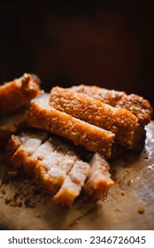 Pork belly crispy on a wooden chopping board