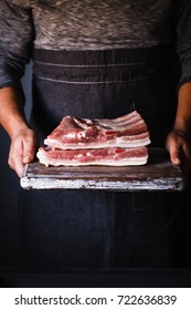 Pork belly Farm fresh Pork Belly butcher person curring bacon porchetta
