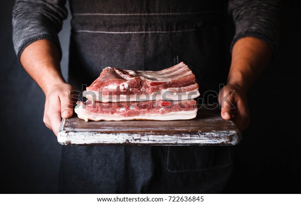 Pork belly Farm fresh Pork Belly butcher
person curring bacon
porchetta
