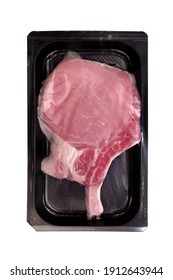 Pork Bone Steak In Vacuum Commercial Plastic Pack Isolated On White Background. Raw Tomahawk Pork Steak In Vacuum Airtight Pack White Isolated. Pork Bone Steak In Vacuum Package, Overhead View.