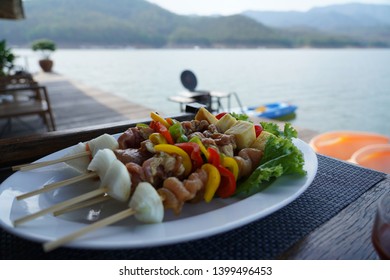 Pork And Chicken Barbecue Party In The Lake House.