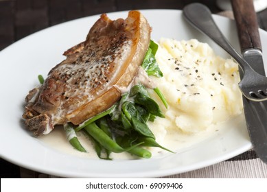 Pork Chop With Mashed Potatoes And Cider Sauce