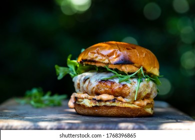 Pork And Chorizo Burger With Cheese In Brioche Bun