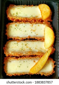 Pork Cutlet With Cheese And Potatos