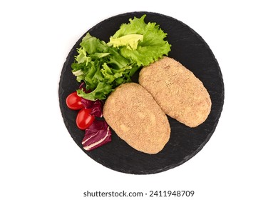 Pork cutlets in breadcrumbs, isolated on white background. High resolution image