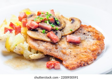 Pork Fillet With Cooked Potato Served With Mushroom And Bacon Sauce