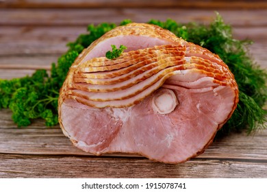 Pork Ham Sliced With Herb On Wooden Background. Top View.