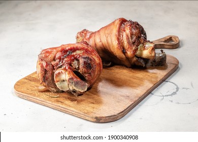 Pork hock on wooden board