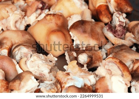 Pork, lard, pigskin chopped into pieces at the Thai market of meat products. Pig background