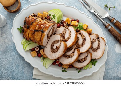 Pork loin roasted filled with cranberry bread stuffing